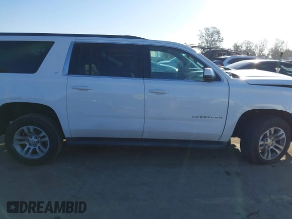 2015 Chevrolet Suburban LT with VIN 1GNSCJKC2FR680413, listed as a IAAI auction lot 41634666 with 127,175 mi miles and . Bid and sale history available at DreamBid. Image 13.