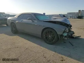 2012 Dodge Challenger SXT with VIN 2C3CDYAG7CH225015, listed as a Copart auction lot 51009695 with 120,915 mi miles and Salvage Title. Bid and sale history available at carsss.com. Image 11.