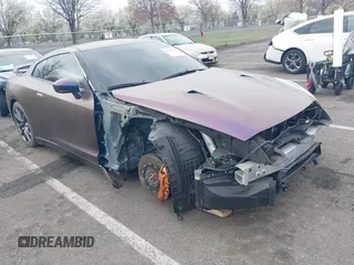 2014 Nissan GT-R Premium z VIN JN1AR5EF7EM270544, wystawiony jako IAAI lot #41897633 z przebiegiem 49 352 mil mil oraz . Historia ofert i sprzedaży dostępna na DreamBid. Obrazek 1.