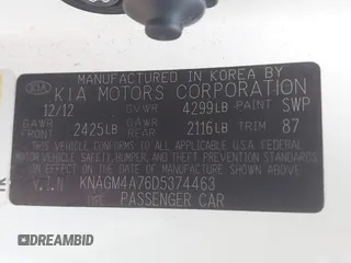 2013 Kia Optima LX with VIN KNAGM4A76D5374463, listed as a IAAI auction lot 42007879 with 167,445 mi miles. Bid and sale history available at carsss.com. Image 9.