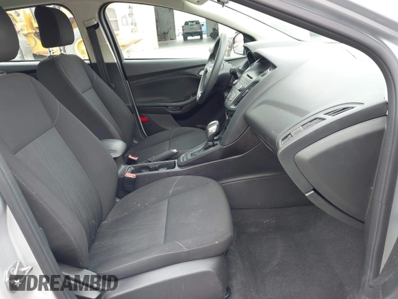 2015 Ford Focus SE z VIN 1FADP3F21FL218369, wystawiony jako IAAI lot #42126986 z przebiegiem 99 844 mil mil oraz . Historia ofert i sprzedaży dostępna na DreamBid. Obrazek 5.