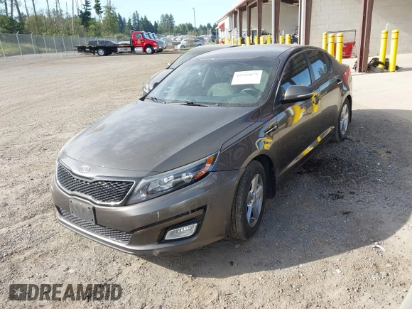 2015 Kia Optima LX with VIN 5XXGM4A77FG353705, listed as a IAAI auction lot 42519873 with 126,066 mi miles and . Bid and sale history available at DreamBid. Image 2.