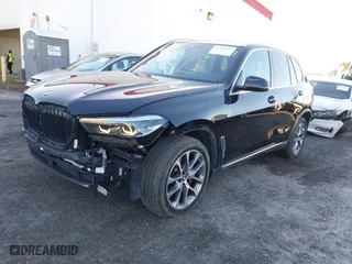 2023 BMW X5 sDrive40i with VIN 5UXCR4C06P9N83023, listed as a IAAI auction lot 41513687 with 42,211 mi miles. Bid and sale history available at carsss.com. Image 21.