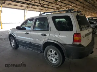 2006 Ford Escape XLT with VIN 1FMYU03166KA73605, listed as a Copart auction lot 71968524 with 143,742 mi miles and Salvage Title. Bid and sale history available at carsss.com. Image 2.