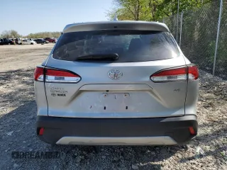2022 Toyota Corolla Cross LE with VIN 7MUCAAAGXNV012565, listed as a Copart auction lot 54573305 with 53,053 mi miles and Salvage title. Bid and sale history available at DreamBid. Image 6.
