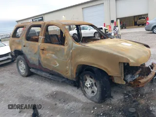 2009 Chevrolet Tahoe 2LT z VIN 1GNFK23039J101981, wystawiony jako IAAI lot #41509666 z przebiegiem 156 936 mil mil oraz . Historia ofert i sprzedaży dostępna na DreamBid. Obrazek 1.