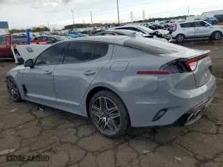 2023 Kia Stinger GT2 with VIN KNAE55LC1P6134059, listed as a Copart auction lot 72999604 with 36,679 mi miles and Salvage Title. Bid and sale history available at carsss.com. Image 2.