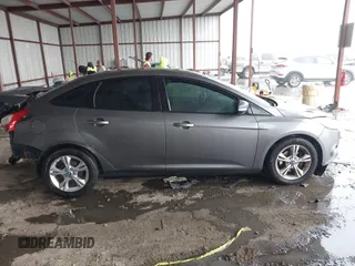 2013 Ford Focus SE with VIN 1FADP3F29DL243937, listed as a IAAI auction lot 42145911 with 90,376 mi miles and . Bid and sale history available at DreamBid. Image 13.