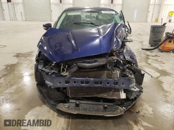 2016 Ford Focus Titanium z VIN 1FADP3J27GL310367, wystawiony jako Copart lot #55048005 z przebiegiem 86 676 mil mil oraz Szkoda całkowita • Salvage title. Historia ofert i sprzedaży dostępna na DreamBid. Obrazek 5.