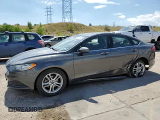 2018 Ford Fusion SE z VIN 3FA6P0HD2JR161180, wystawiony jako Copart lot #65741655 z przebiegiem 152 972 mil mil oraz Czysty tytuł • Clean title. Historia ofert i sprzedaży dostępna na DreamBid. Obrazek 1.