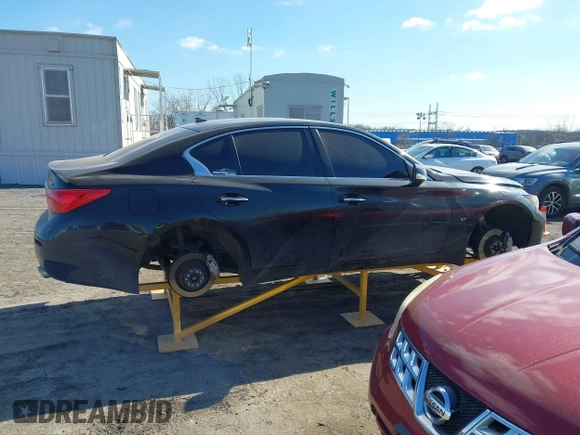 2015 Infiniti Q50 Premium with VIN JN1BV7AR6FM393586, listed as a IAAI auction lot 41683059 with 125,991 mi miles. Bid and sale history available at carsss.com. Image 13.