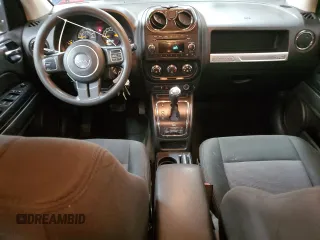 2014 Jeep Compass Sport with VIN 1C4NJDBB0ED598518, listed as a Copart auction lot 55072665 with 128,141 mi miles and Salvage Title. Bid and sale history available at carsss.com. Image 8.