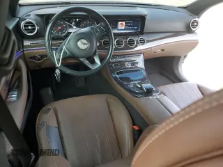 2017 Mercedes-Benz E 300 Luxury with VIN WDDZF4KBXHA063551, listed as a Copart auction lot 84860314 with 134,067 mi miles and Salvage title. Bid and sale history available at DreamBid. Image 8.