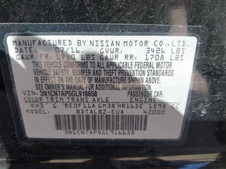 2016 Nissan Versa S with VIN 3N1CN7AP5GL916658, listed as a IAAI auction lot 42093204 with 112,085 mi miles. Bid and sale history available at carsss.com. Image 9.