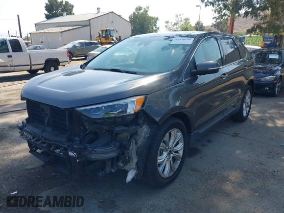 2020 Ford Edge Titanium with VIN 2FMPK3K94LBB10568, listed as a IAAI auction lot 42430196 with 76,490 mi miles and . Bid and sale history available at DreamBid. Image 2.