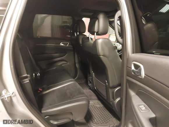 2018 Jeep Grand Cherokee Laredo E with VIN 1C4RJFAG4JC285384, listed as a IAAI auction lot 41629723 with 66,603 mi miles. Bid and sale history available at carsss.com. Image 8.