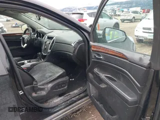 2012 Cadillac SRX Performance Collection with VIN 3GYFNBE38CS630415, listed as a IAAI auction lot 41753419 with 130,436 mi miles. Bid and sale history available at carsss.com. Image 5.