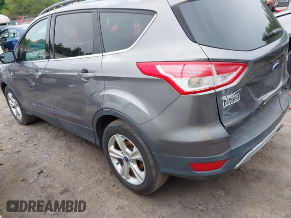 2014 Ford Escape SE with VIN 1FMCU9GX8EUA65568, listed as a IAAI auction lot 42435114 with 128,278 mi miles and . Bid and sale history available at DreamBid. Image 3.