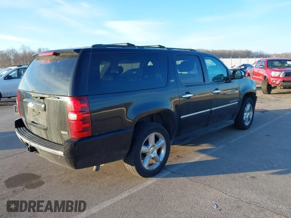 2010 Chevrolet Suburban LTZ with VIN 1GNUKKE3XAR142743, listed as a IAAI auction lot 41413380 with 236,384 mi miles. Bid and sale history available at carsss.com. Image 4.