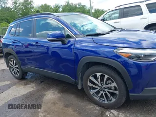 2023 Toyota Corolla Cross XLE with VIN 7MUEAAAG7PV065106, listed as a IAAI auction lot 42168195 with 6,519 mi miles and . Bid and sale history available at DreamBid. Image 13.