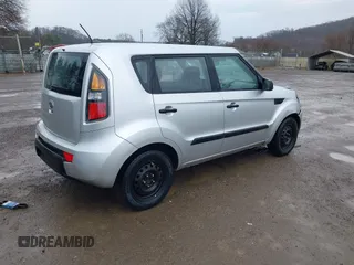 2011 Kia Soul with VIN KNDJT2A15B7319127, listed as a IAAI auction lot 41899511 with 210,660 mi miles. Bid and sale history available at carsss.com. Image 4.