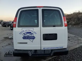 2021 Chevrolet Express Cargo with VIN 1GCWGBFP0M1206747, listed as a Copart auction lot 82701894 with Not provided miles and Salvage title. Bid and sale history available at DreamBid. Image 6.