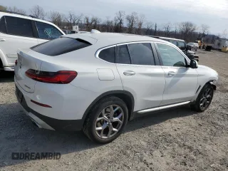 2024 BMW X4 xDrive30i z VIN 5UX33DT09R9U71062, wystawiony jako Copart lot #52200375 z przebiegiem 21 979 mil mil oraz Szkoda całkowita • Salvage title. Historia ofert i sprzedaży dostępna na DreamBid. Obrazek 3.