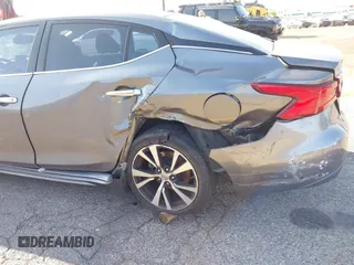 2018 Nissan Maxima SL with VIN 1N4AA6AP1JC400557, listed as a IAAI auction lot 42094626 with 96,764 mi miles and . Bid and sale history available at DreamBid. Image 6.