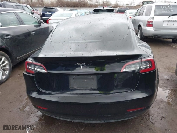 2023 Tesla Model 3 with VIN 5YJ3E1EA1PF512562, listed as a IAAI auction lot 41719618 with 43,612 mi miles. Bid and sale history available at carsss.com. Image 17.