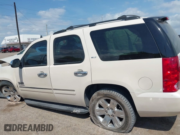 2013 GMC Yukon SLT with VIN 1GKS1CE0XDR276496, listed as a IAAI auction lot 42036042 with 157,047 mi miles. Bid and sale history available at carsss.com. Image 15.