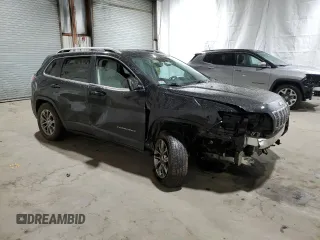 2020 Jeep Cherokee Latitude Plus with VIN 1C4PJMLX1LD635981, listed as a Copart auction lot 74984994 with 113,107 mi miles and Salvage Title. Bid and sale history available at DreamBid. Image 4.