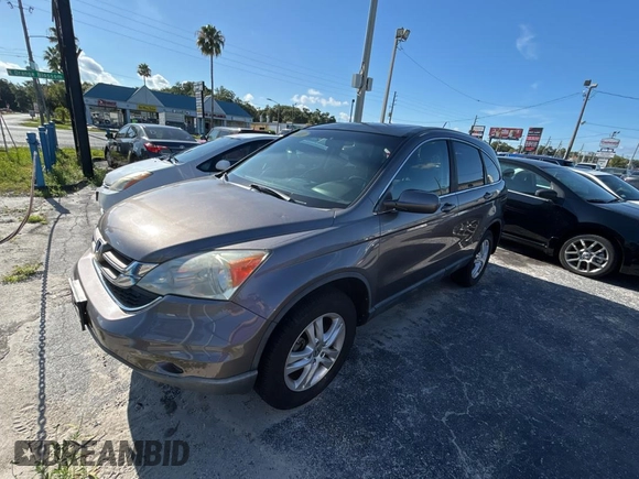 2011 Honda CR-V EX-L z VIN 5J6RE4H74BL060649, wystawiony jako Copart lot #61692905 z przebiegiem 183 943 mil mil oraz Czysty tytuł • Clean title. Historia ofert i sprzedaży dostępna na DreamBid. Obrazek 2.