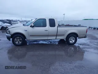 1999 Ford F-150 XL with VIN 1FTRX17L1XNA06282, listed as a IAAI auction lot 41545503 with 234,817 mi miles. Bid and sale history available at carsss.com. Image 14.