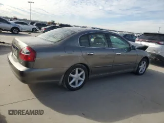 2004 Infiniti Q45 z VIN JNKBF01AX4M500632, wystawiony jako Copart lot #87741405 z przebiegiem 188 505 mil mil oraz Szkoda całkowita • Salvage title. Historia ofert i sprzedaży dostępna na DreamBid. Obrazek 3.