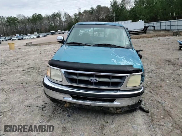 1998 Ford F-150 z VIN 1FTDF17W2WNA09312, wystawiony jako Copart lot #48290845 z przebiegiem 167 417 mil mil oraz Szkoda całkowita • Salvage title. Historia ofert i sprzedaży dostępna na DreamBid. Obrazek 11.