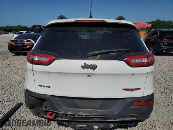 2015 Jeep Cherokee Trailhawk with VIN 1C4PJMBB1FW771865, listed as a Copart auction lot 61905315 with 99,554 mi miles and Clean title. Bid and sale history available at DreamBid. Image 6.