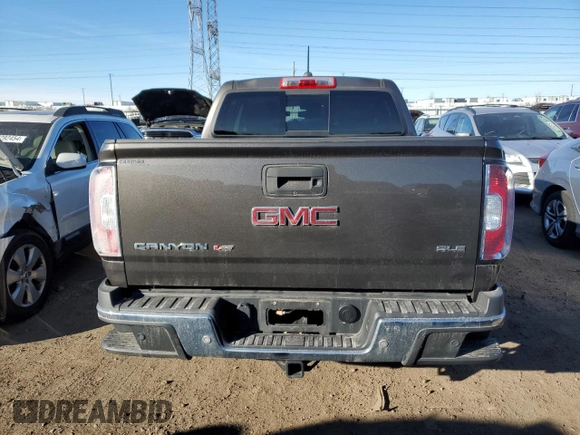 2019 GMC Canyon 4WD SLE with VIN 1GTG6CEN0K1266330, listed as a Copart auction lot 87117014 with 42,096 mi miles and Salvage Title. Bid and sale history available at carsss.com. Image 6.
