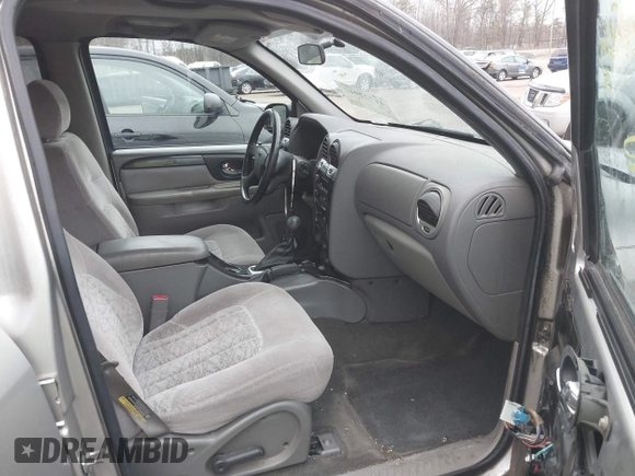 2004 GMC Envoy SLT with VIN 1GKDT13S242398113, listed as a IAAI auction lot 41722942 with 175,173 mi miles and . Bid and sale history available at DreamBid. Image 5.