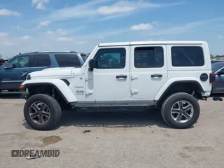 2018 Jeep Wrangler Unlimited Sahara z VIN 1C4HJXEG0JW245118, wystawiony jako IAAI lot #42066614 z przebiegiem 83 743 mil mil oraz . Historia ofert i sprzedaży dostępna na DreamBid. Obrazek 15.