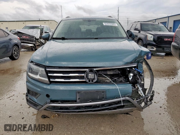 2021 Volkswagen Tiguan SE z VIN 3VV3B7AX9MM066823, wystawiony jako Copart lot #55422685 z przebiegiem 103 524 mil mil oraz Szkoda całkowita • Salvage title. Historia ofert i sprzedaży dostępna na DreamBid. Obrazek 5.