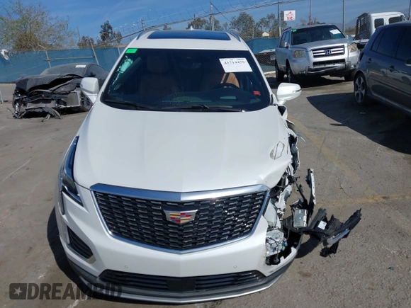 2023 Cadillac XT5 AWD Premium Luxury with VIN 1GYKNDRS4PZ195431, listed as a IAAI auction lot 41714459 with 13,207 mi miles and . Bid and sale history available at DreamBid. Image 12.