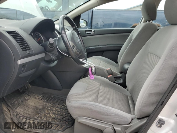 2012 Nissan Sentra S with VIN 3N1AB6AP9CL670489, listed as a Copart auction lot 57072585 with 180,791 mi miles and Salvage title. Bid and sale history available at DreamBid. Image 7.