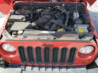 2008 Jeep Wrangler X with VIN 1J4FA24118L548583, listed as a Copart auction lot 52644785 with 56,886 mi miles and Salvage Title. Bid and sale history available at DreamBid. Image 11.