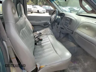 1998 Ford F-150 with VIN 1FTDF1726WNA02621, listed as a Copart auction lot 74929234 with 188,441 mi miles and Salvage title. Bid and sale history available at DreamBid. Image 7.