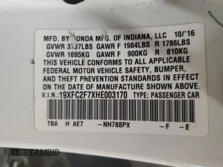 2017 Honda Civic EX z VIN 19XFC2F7XHE003170, wystawiony jako Copart lot #57620105 z przebiegiem 231 942 mil mil oraz Szkoda całkowita • Salvage title. Historia ofert i sprzedaży dostępna na DreamBid. Obrazek 13.