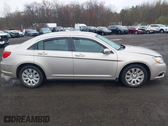 2014 Chrysler 200 LX with VIN 1C3CCBAB2EN213983, listed as a IAAI auction lot 42006774 with 80,615 mi miles and . Bid and sale history available at carsss.com. Image 13.