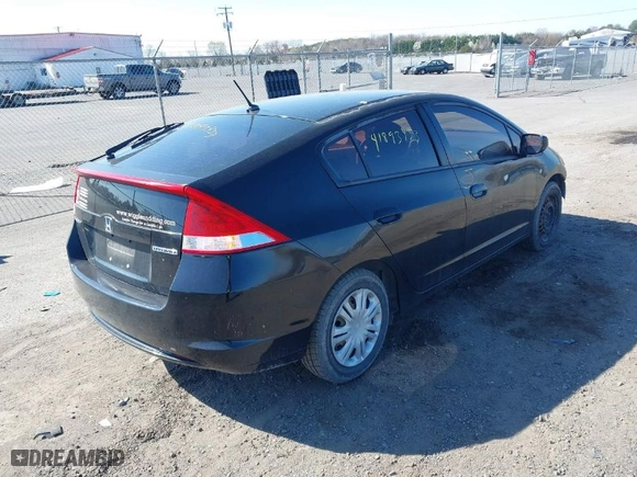 2010 Honda Insight LX with VIN JHMZE2H51AS022064, listed as a IAAI auction lot 41893433 with 263,542 mi miles. Bid and sale history available at carsss.com. Image 4.