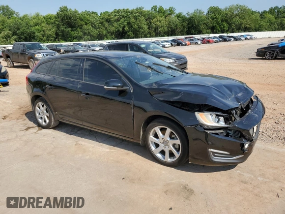 2015 Volvo V60 z VIN YV140MEA2F1209442, wystawiony jako Copart lot #54936914 z przebiegiem Nie podano mil oraz Szkoda całkowita • Salvage title. Historia ofert i sprzedaży dostępna na DreamBid. Obrazek 4.