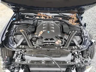 2023 BMW 7 Series 760i xDrive with VIN WBA33EJ04PCN52350, listed as a Copart auction lot 44487295 with 10,878 mi miles and Salvage Title. Bid and sale history available at carsss.com. Image 11.