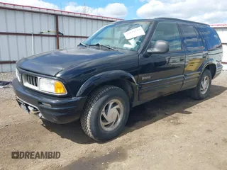 1997 Oldsmobile Bravada z VIN 1GHDT13W3V2707243, wystawiony jako IAAI lot #42024114 z przebiegiem 185 219 mil mil oraz . Historia ofert i sprzedaży dostępna na DreamBid. Obrazek 2.